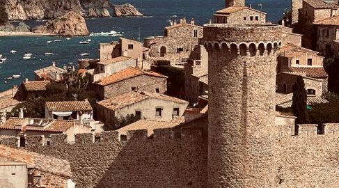 A historic castle with sea views in Tossa de Mar, Spain, showcasing medieval architecture.