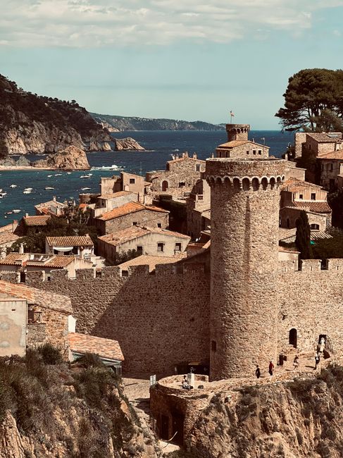 A historic castle with sea views in Tossa de Mar, Spain, showcasing medieval architecture.